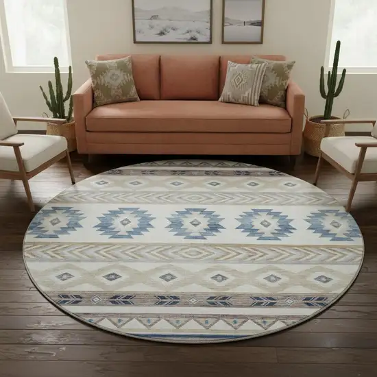 8' Taupe Ivory And Blue Geometric Washable Round Rug With UV Protection Photo 1