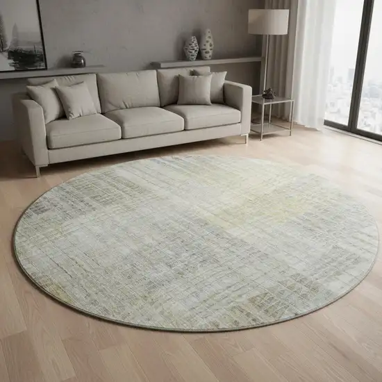 8' Taupe Ivory And Gold Abstract Geometric Washable Round Rug With UV Protection Photo 2