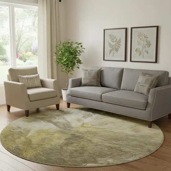 8' Taupe Ivory And Gold Abstract Washable Round Rug With UV Protection Photo 1