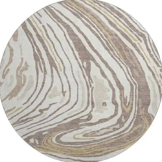 8' Taupe Ivory And Gold Abstract Washable Round Rug With UV Protection Photo 3