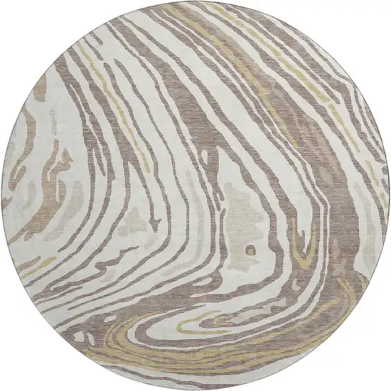 8' Taupe Ivory And Gold Abstract Washable Round Rug With UV Protection Photo 1