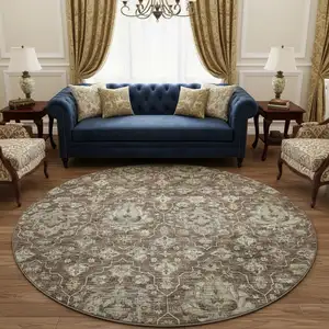 Photo of 8' Taupe Ivory And Gold Floral Medallion Washable Round Rug With UV Protection