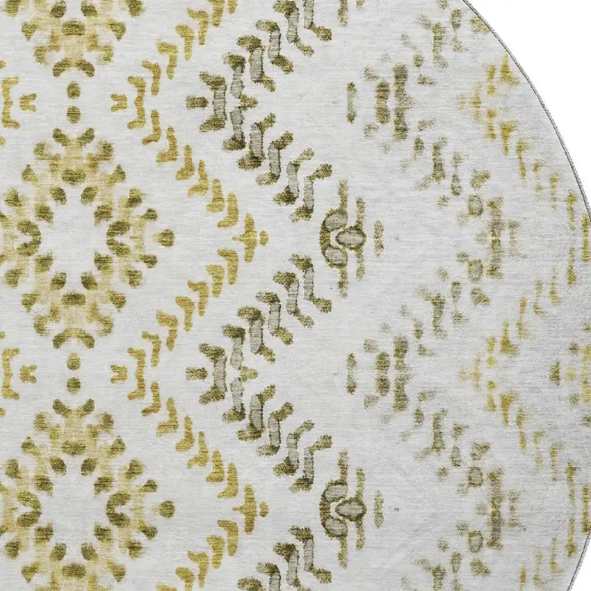 8' Taupe Ivory And Gold Geometric Washable Round Rug With UV Protection Photo 3