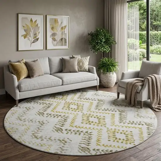 8' Taupe Ivory And Gold Geometric Washable Round Rug With UV Protection Photo 1