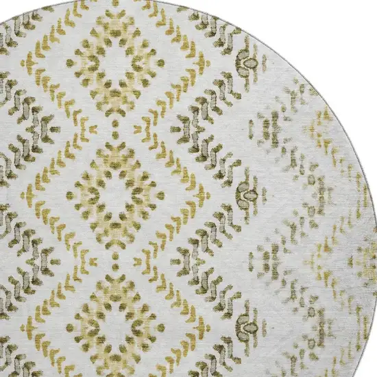 8' Taupe Ivory And Gold Geometric Washable Round Rug With UV Protection Photo 4