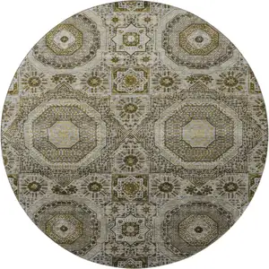 Photo of 8' Taupe Ivory And Gold Medallion Washable Round Rug With UV Protection