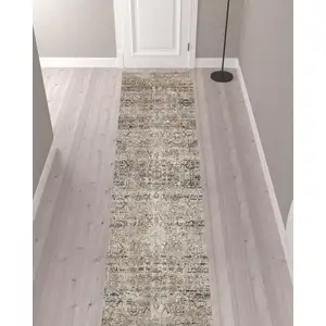 Photo of 12' Taupe Ivory And Gray Abstract Distressed Runner Rug With Fringe