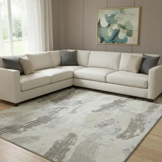 8' Taupe Ivory And Gray Abstract Washable Area Rug With UV Protection Photo 2