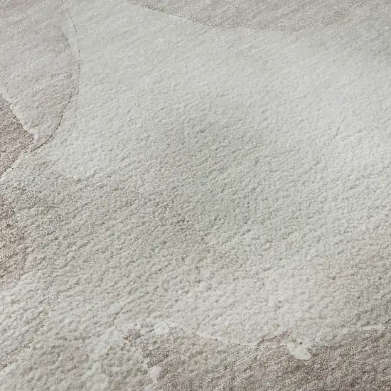 8' Taupe Ivory And Gray Abstract Washable Round Rug With UV Protection Photo 9