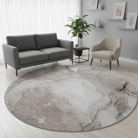 8' Taupe Ivory And Gray Abstract Washable Round Rug With UV Protection Photo 2