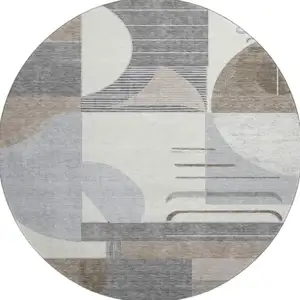 Photo of 8' Taupe Ivory And Gray Geometric Washable Round Rug With UV Protection