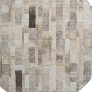 Photo of 8' Taupe Ivory And Gray Striped Washable Round Rug With UV Protection