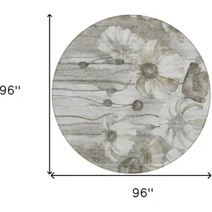 Photo of 8' Taupe Ivory And Tan Round Floral Washable Indoor Outdoor Area Rug