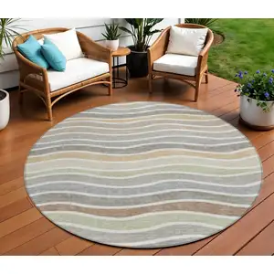 Photo of 8' Taupe Ivory And Wheat Round Striped Washable Indoor Outdoor Area Rug