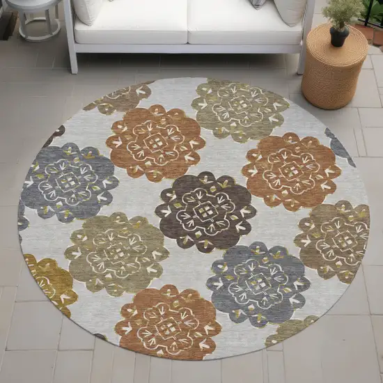 8' Taupe Orange And Ivory Round Quatrefoil Washable Indoor Outdoor Area Rug Photo 9
