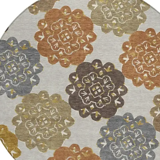 8' Taupe Orange And Ivory Round Quatrefoil Washable Indoor Outdoor Area Rug Photo 7