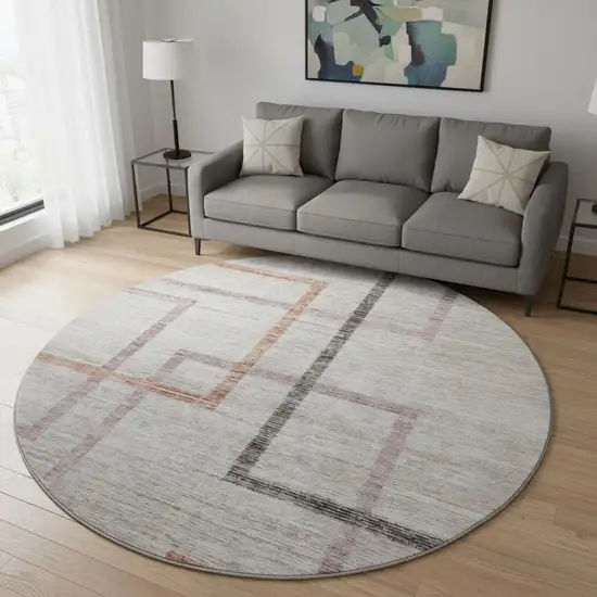 8' Taupe Purple And Copper Geometric Washable Round Rug With UV Protection Photo 2