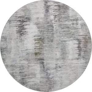Photo of 8' Taupe Silver And Purple Abstract Washable Round Rug With UV Protection