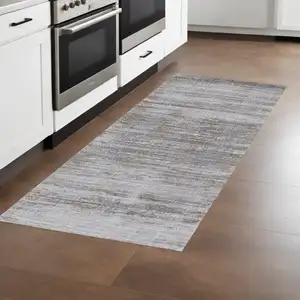 Photo of 8' Taupe Silver And Tan Abstract Power Loom Runner Rug