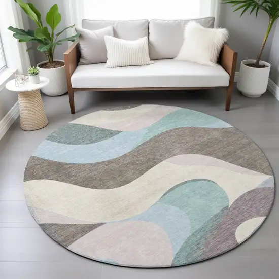 8' Taupe Sky Blue And Ivory Round Abstract Washable Indoor Outdoor Area Rug Photo 9