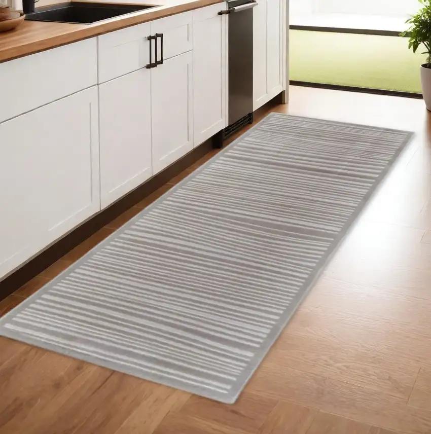 8' Taupe and Gray Power Loom Runner Rug Photo 1