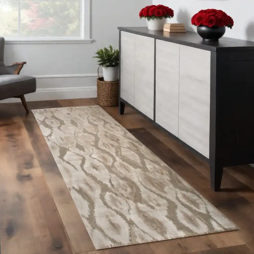 8' Taupe and Ivory Abstract Power Loom Worn Faded Runner Rug Photo 1