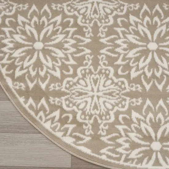 8' Taupe and Ivory Floral Non Skid Round Rug Photo 6