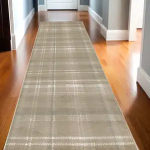 Photo of 12' Taupe and Ivory Plaid Runner Rug