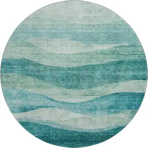 Photo of 8' Teal And Aqua Abstract Washable Round Rug With UV Protection