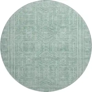 Photo of 8' Teal And Aqua Geometric Washable Round Rug With UV Protection