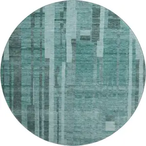 Photo of 8' Teal And Aqua Striped Washable Round Rug With UV Protection
