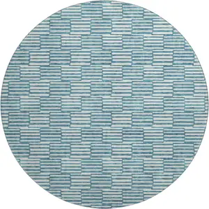 Photo of 8' Teal And Beige Abstract Geometric Washable Round Rug With UV Protection