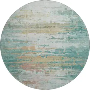 Photo of 8' Teal And Beige Abstract Washable Round Rug With UV Protection
