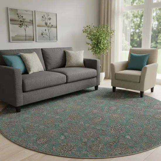 8' Teal And Beige Floral Washable Round Rug With UV Protection Photo 1