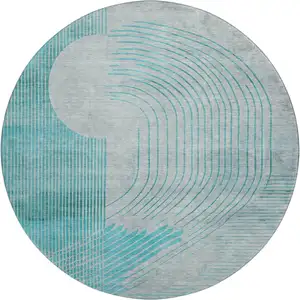 Photo of 8' Teal And Beige Geometric Washable Round Rug With UV Protection