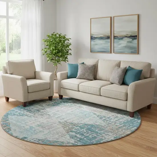 8' Teal And Beige Geometric Washable Round Rug With UV Protection Photo 2