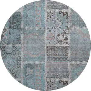 Photo of 8' Teal And Beige Patchwork Washable Round Rug With UV Protection