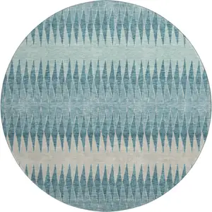 Photo of 8' Teal And Beige Striped Washable Round Rug With UV Protection