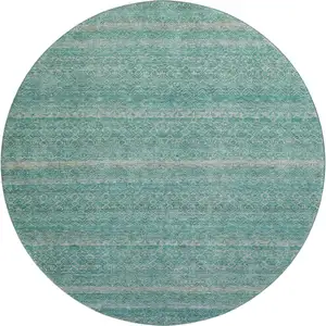 Photo of 8' Teal And Beige Striped Washable Round Rug With UV Protection