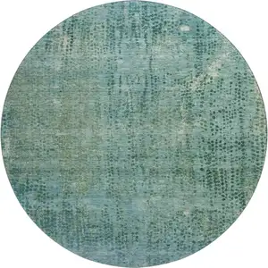 Photo of 8' Teal And Blue Abstract Washable Round Rug With UV Protection