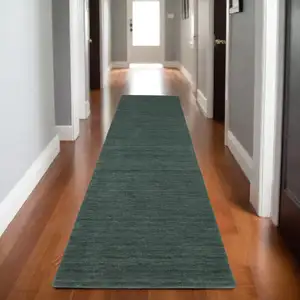 Photo of 8' Teal And Blue Wool Hand Tufted Runner Rug