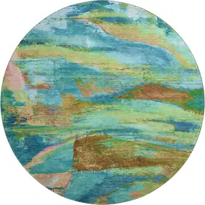 Photo of 8' Teal And Blush Abstract Washable Round Rug With UV Protection