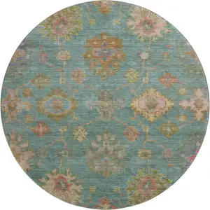 Photo of 8' Teal And Blush Oriental Washable Round Rug With UV Protection
