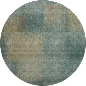 Photo of 8' Teal And Brown Abstract Washable Round Rug With UV Protection