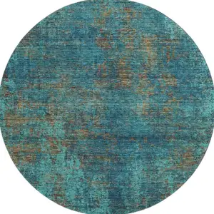 Photo of 8' Teal And Brown Abstract Washable Round Rug With UV Protection