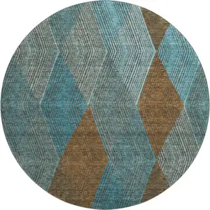 Photo of 8' Teal And Brown Geometric Washable Round Rug With UV Protection