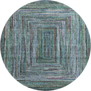 Photo of 8' Teal And Brown Geometric Washable Round Rug With UV Protection