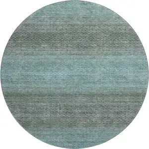 Photo of 8' Teal And Brown Geometric Washable Round Rug With UV Protection