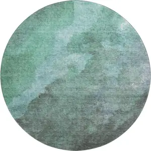 Photo of 8' Teal And Charcoal Abstract Washable Round Rug With UV Protection