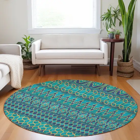 8' Teal And Gold Ikat Washable Round Rug With UV Protection Photo 5